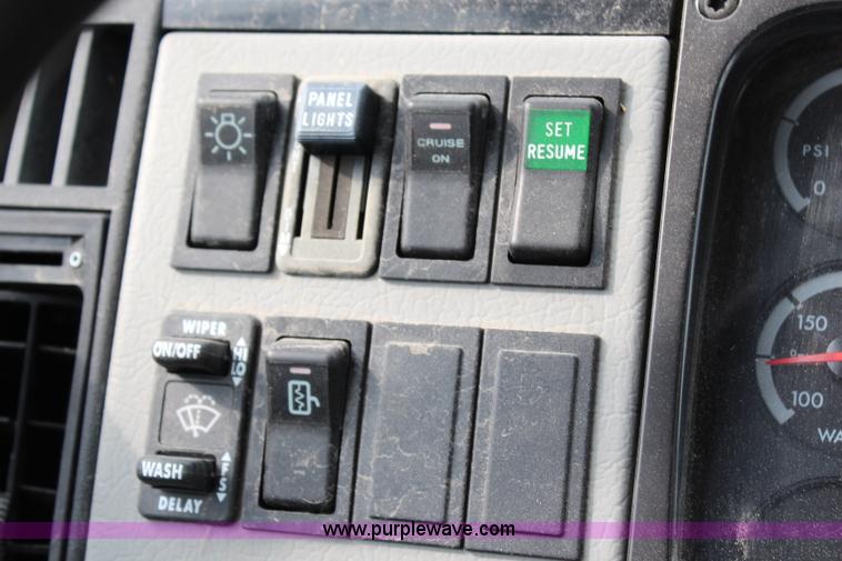 image for item H2715 2002 Freightliner FL70 Crew Cab flatbed truck