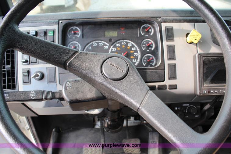 image for item H2715 2002 Freightliner FL70 Crew Cab flatbed truck