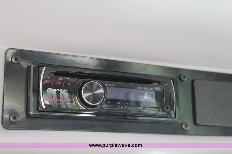 image for item H2715 2002 Freightliner FL70 Crew Cab flatbed truck