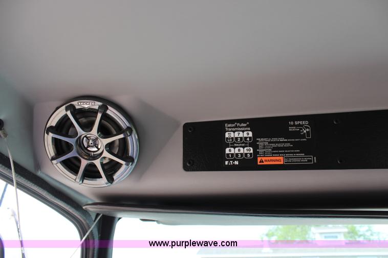 image for item H2715 2002 Freightliner FL70 Crew Cab flatbed truck