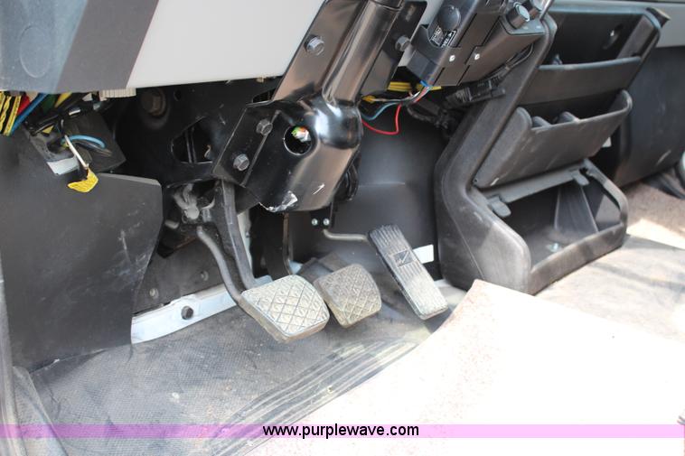 image for item H2715 2002 Freightliner FL70 Crew Cab flatbed truck