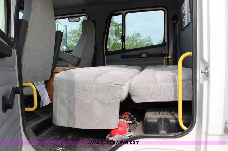 image for item H2715 2002 Freightliner FL70 Crew Cab flatbed truck