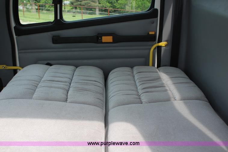 image for item H2715 2002 Freightliner FL70 Crew Cab flatbed truck