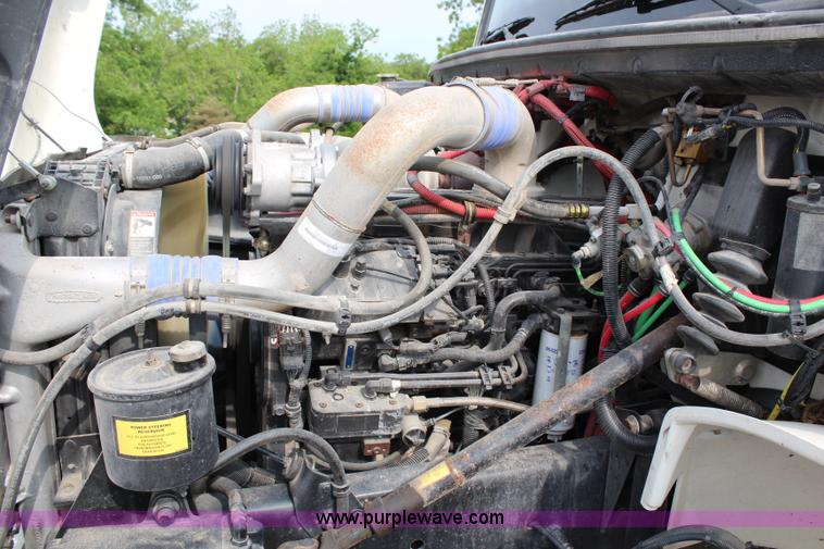 image for item H2715 2002 Freightliner FL70 Crew Cab flatbed truck