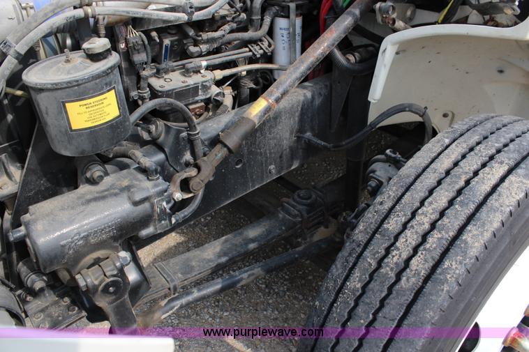 image for item H2715 2002 Freightliner FL70 Crew Cab flatbed truck