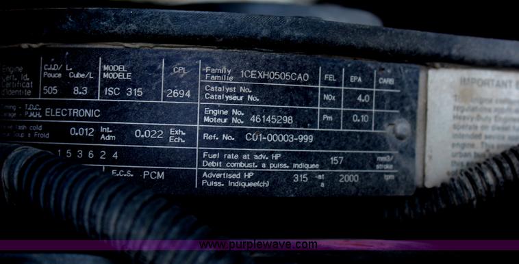 image for item H2715 2002 Freightliner FL70 Crew Cab flatbed truck