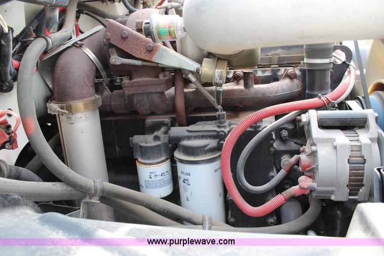 image for item H2715 2002 Freightliner FL70 Crew Cab flatbed truck