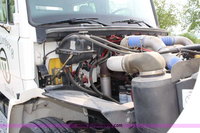 image for item H2715 2002 Freightliner FL70 Crew Cab flatbed truck