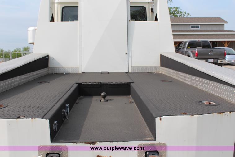 image for item H2715 2002 Freightliner FL70 Crew Cab flatbed truck