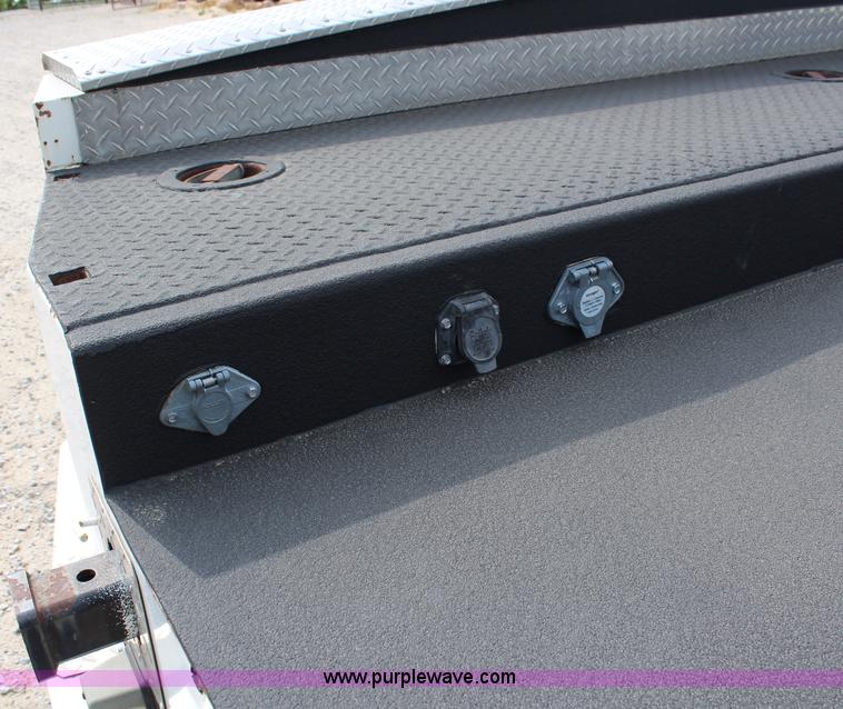 image for item H2715 2002 Freightliner FL70 Crew Cab flatbed truck