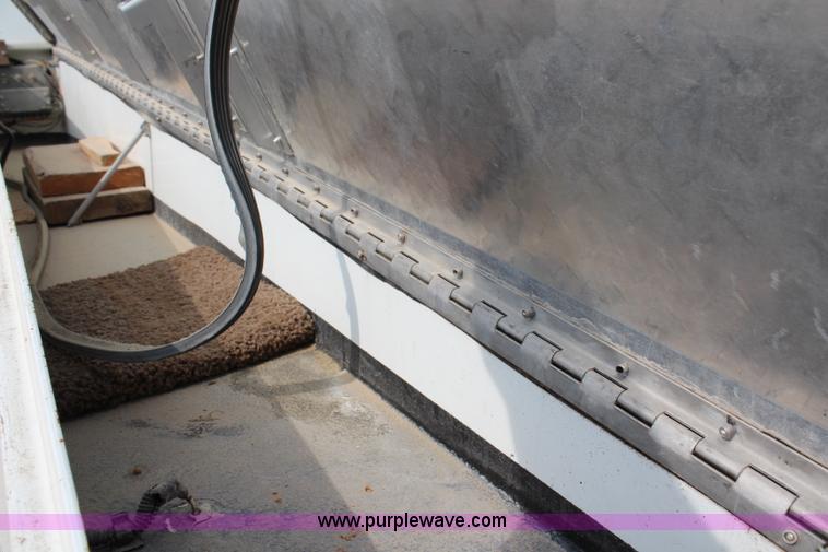 image for item H2715 2002 Freightliner FL70 Crew Cab flatbed truck