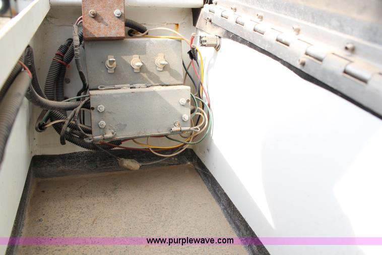 image for item H2715 2002 Freightliner FL70 Crew Cab flatbed truck