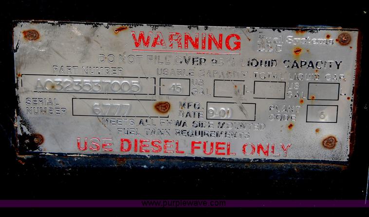 image for item H2715 2002 Freightliner FL70 Crew Cab flatbed truck