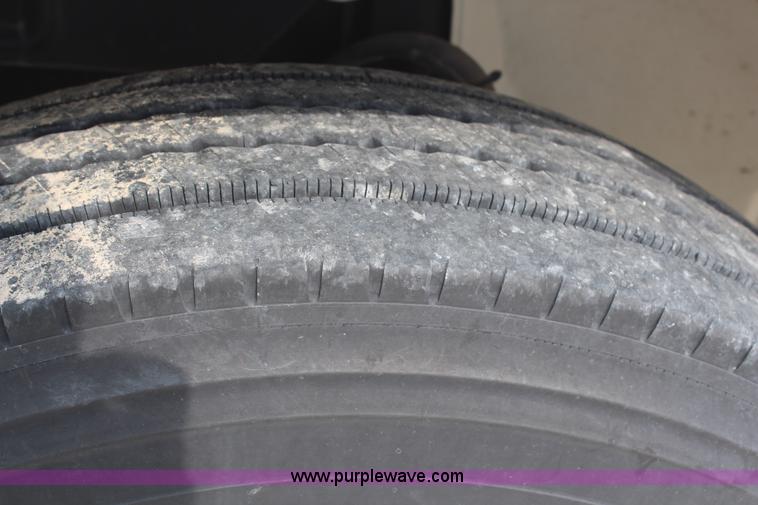 image for item H2715 2002 Freightliner FL70 Crew Cab flatbed truck