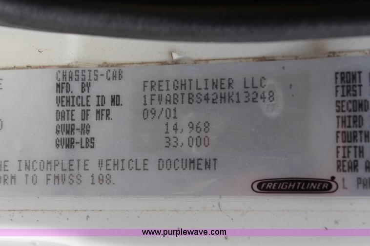 image for item H2715 2002 Freightliner FL70 Crew Cab flatbed truck