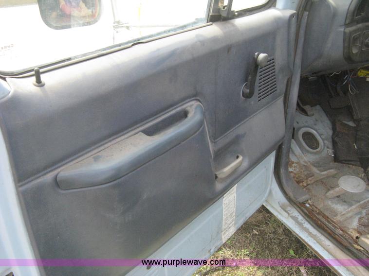 image for item H5377 1989 Ford F450 Super Duty flatbed pickup truck