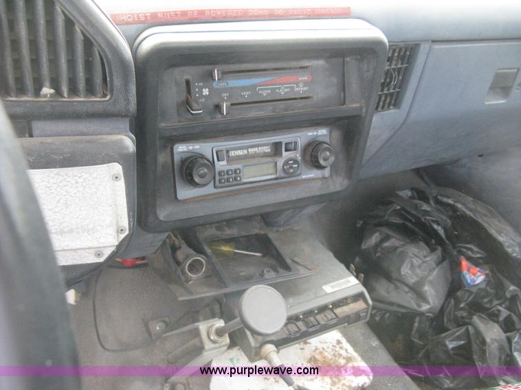 image for item H5377 1989 Ford F450 Super Duty flatbed pickup truck