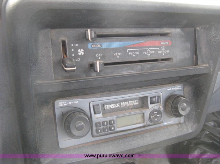 image for item H5377 1989 Ford F450 Super Duty flatbed pickup truck