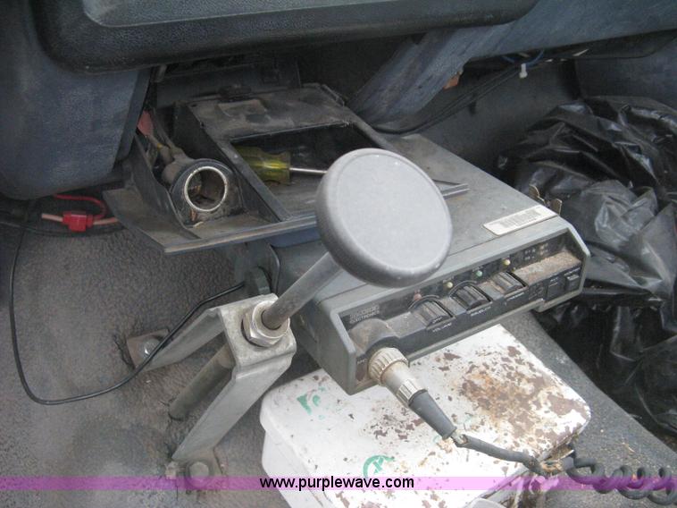 image for item H5377 1989 Ford F450 Super Duty flatbed pickup truck