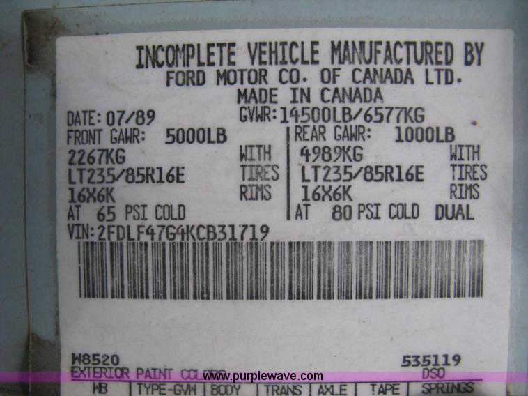 image for item H5377 1989 Ford F450 Super Duty flatbed pickup truck