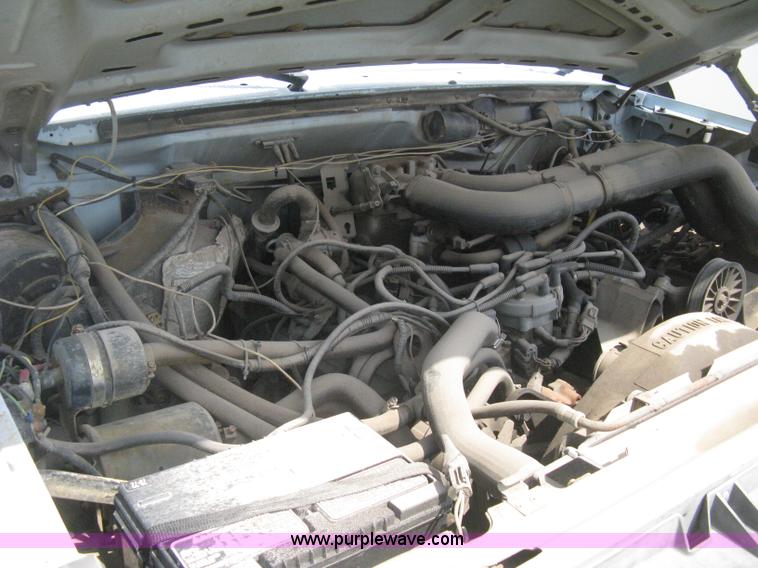 image for item H5377 1989 Ford F450 Super Duty flatbed pickup truck