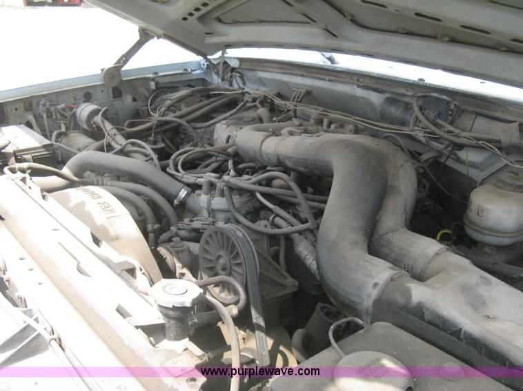 image for item H5377 1989 Ford F450 Super Duty flatbed pickup truck