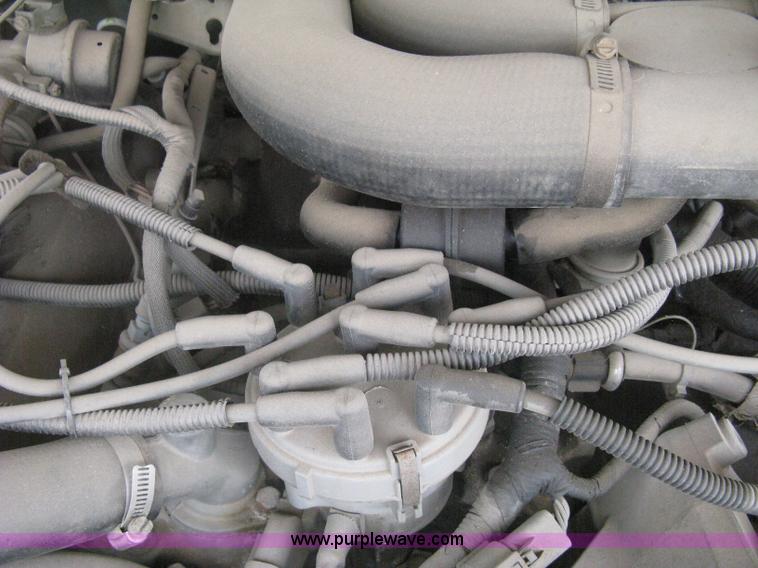 image for item H5377 1989 Ford F450 Super Duty flatbed pickup truck