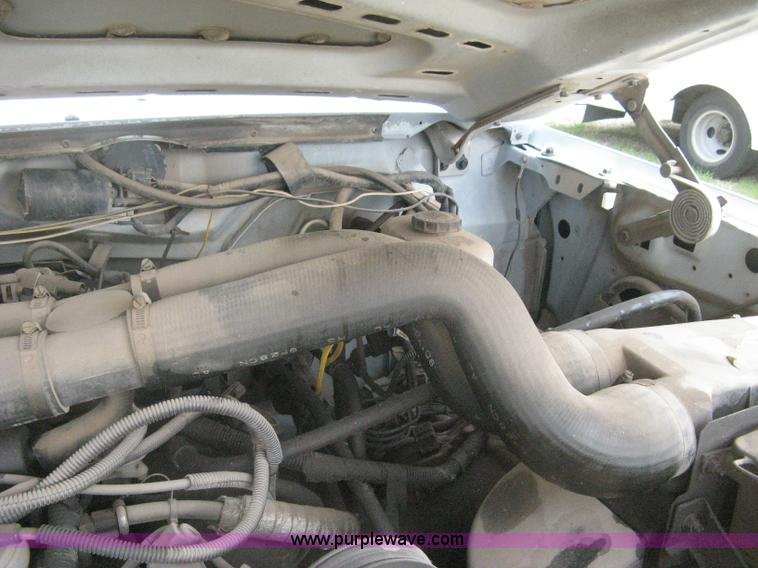 image for item H5377 1989 Ford F450 Super Duty flatbed pickup truck