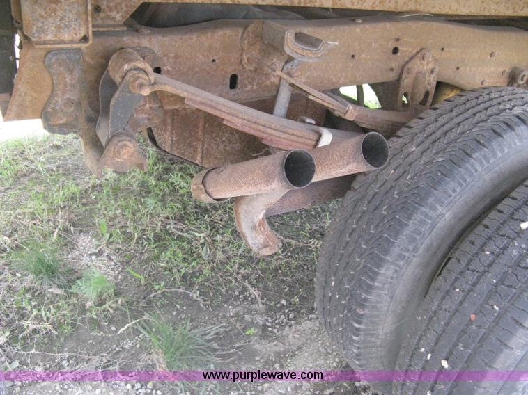 image for item H5377 1989 Ford F450 Super Duty flatbed pickup truck