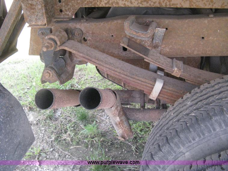 image for item H5377 1989 Ford F450 Super Duty flatbed pickup truck