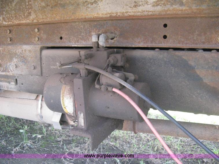 image for item H5377 1989 Ford F450 Super Duty flatbed pickup truck