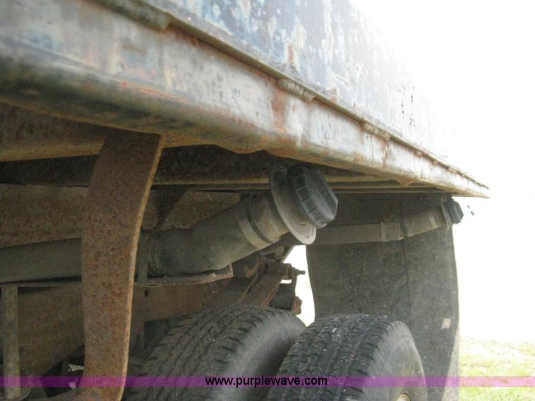 image for item H5377 1989 Ford F450 Super Duty flatbed pickup truck