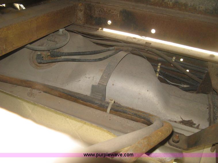 image for item H5377 1989 Ford F450 Super Duty flatbed pickup truck