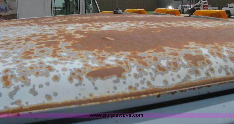 image for item H5377 1989 Ford F450 Super Duty flatbed pickup truck