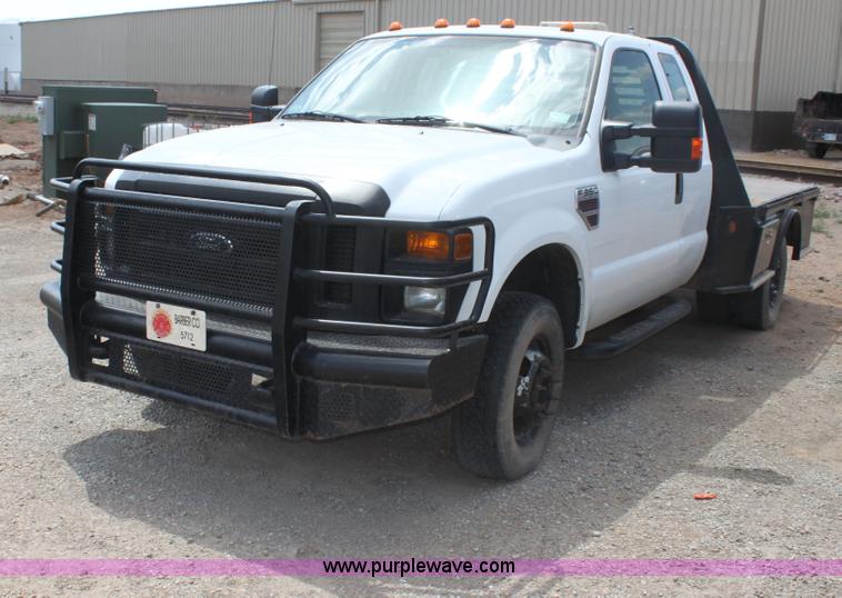 image for item I7424 2008 Ford F350 Super Duty XL SuperCab flatbed truck