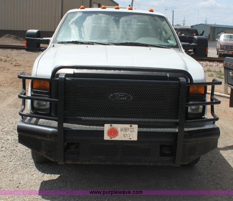 image for item I7424 2008 Ford F350 Super Duty XL SuperCab flatbed truck