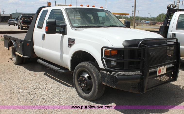 image for item I7424 2008 Ford F350 Super Duty XL SuperCab flatbed truck
