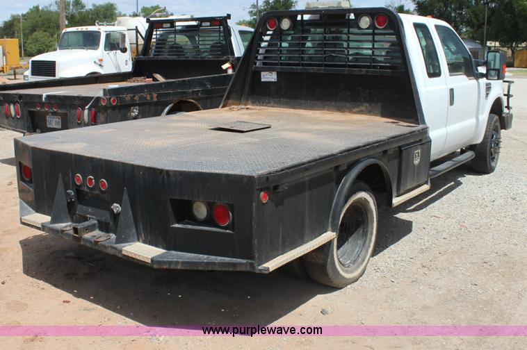 image for item I7424 2008 Ford F350 Super Duty XL SuperCab flatbed truck