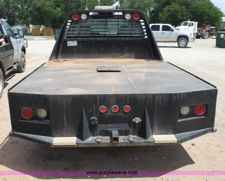 image for item I7424 2008 Ford F350 Super Duty XL SuperCab flatbed truck