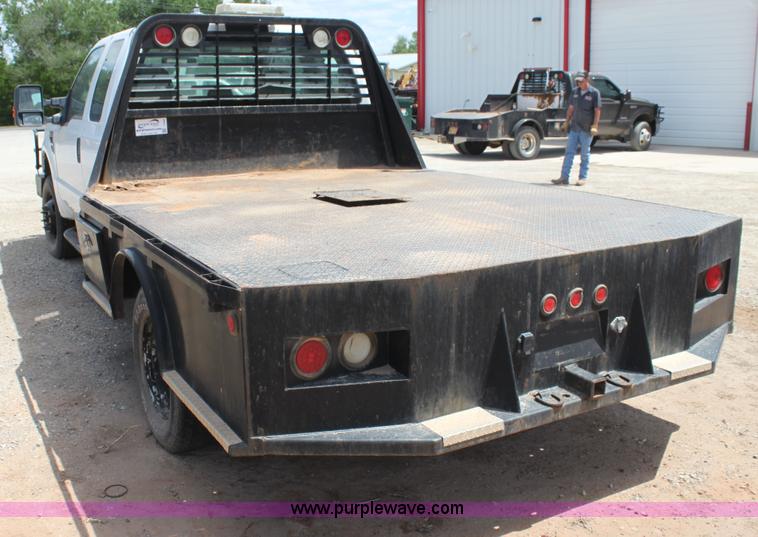 image for item I7424 2008 Ford F350 Super Duty XL SuperCab flatbed truck