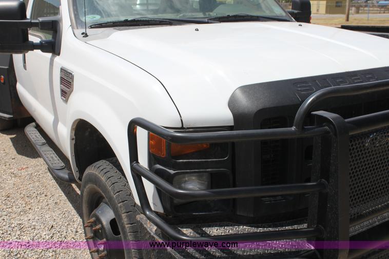 image for item I7424 2008 Ford F350 Super Duty XL SuperCab flatbed truck