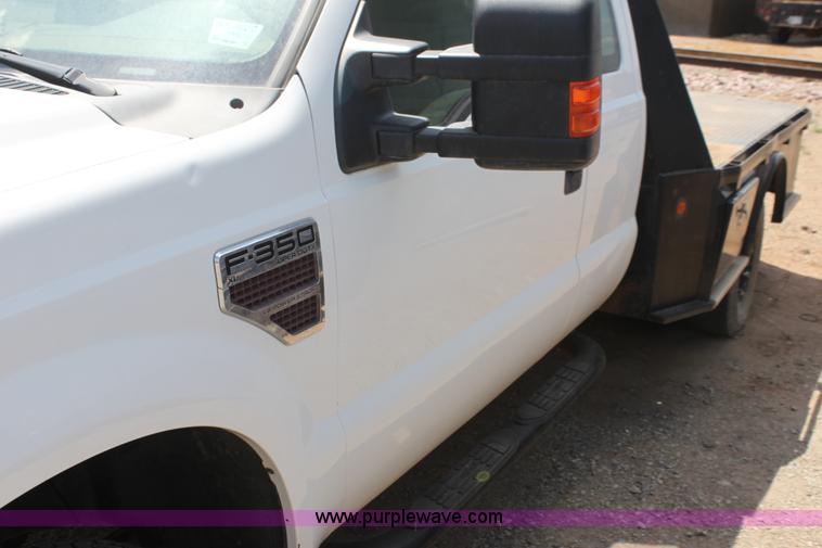 image for item I7424 2008 Ford F350 Super Duty XL SuperCab flatbed truck