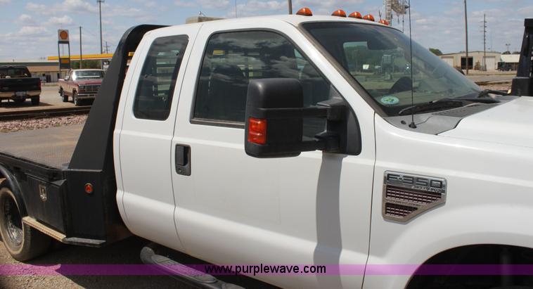 image for item I7424 2008 Ford F350 Super Duty XL SuperCab flatbed truck