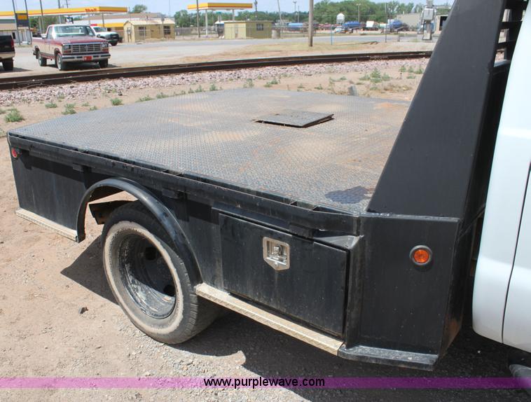 image for item I7424 2008 Ford F350 Super Duty XL SuperCab flatbed truck