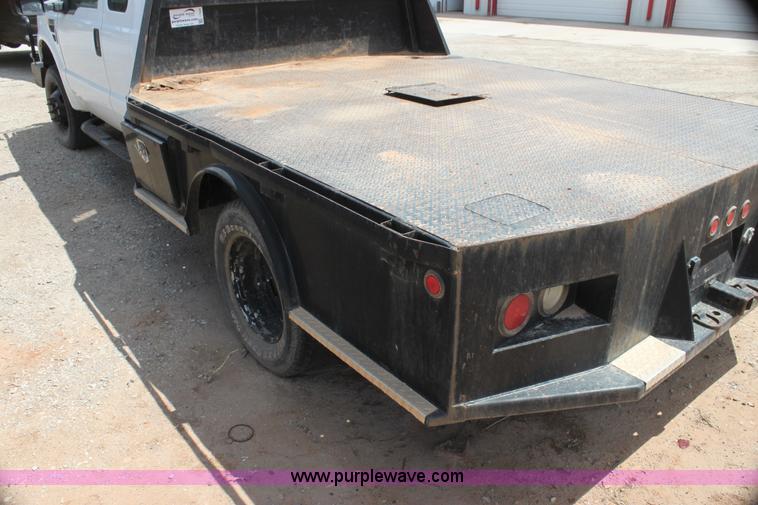 image for item I7424 2008 Ford F350 Super Duty XL SuperCab flatbed truck