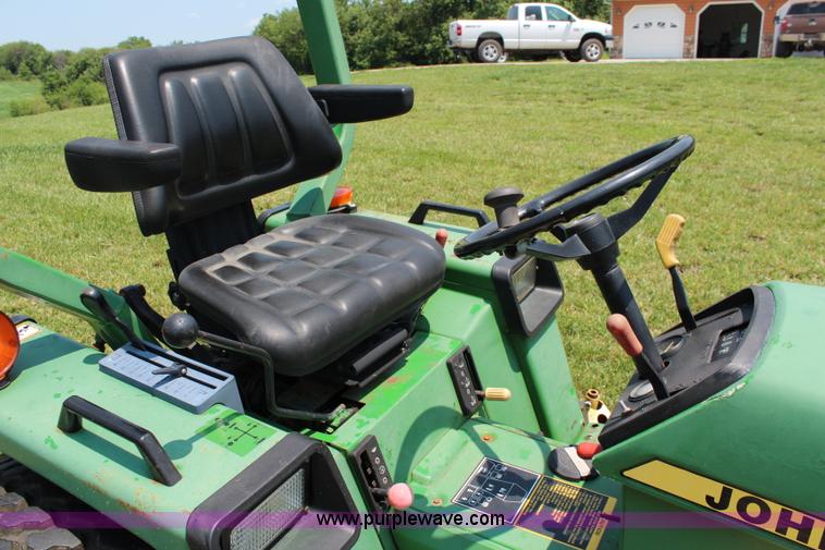 image for item J1024 John Deere 855 MFWD garden tractor