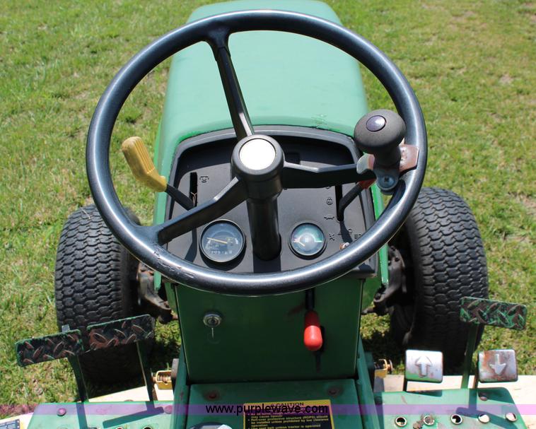 image for item J1024 John Deere 855 MFWD garden tractor