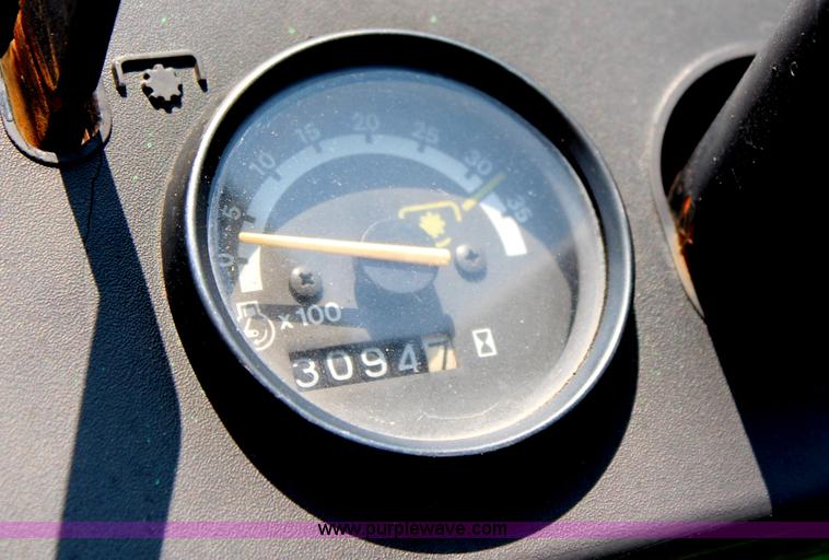 image for item J1024 John Deere 855 MFWD garden tractor