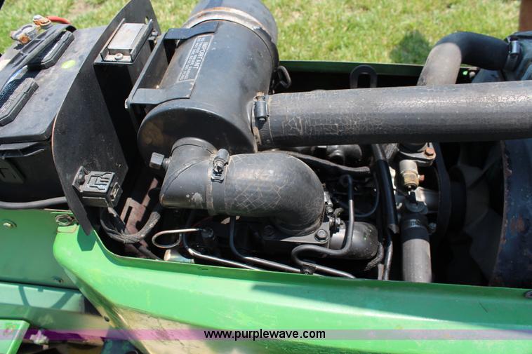 image for item J1024 John Deere 855 MFWD garden tractor