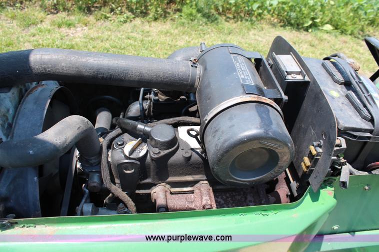 image for item J1024 John Deere 855 MFWD garden tractor